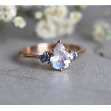 Pear Rainbow Moonstone Ring With Light Blue Sapphires