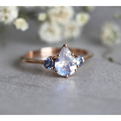 Pear Rainbow Moonstone Ring With Light Blue Sapphires
