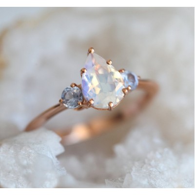 Pear Rainbow Moonstone Ring With Light Blue Sapphires
