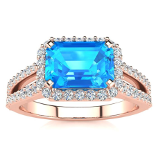 1 1/2 Carat Antique Blue Topaz and Halo Diamond Ring In 14 Karat Rose Gold