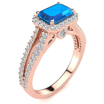 1 1/2 Carat Antique Blue Topaz and Halo Diamond Ring In 14 Karat Rose Gold