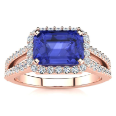 1 1/2 Carat Antique Tanzanite and Halo Diamond Ring In 14 Karat Rose Gold