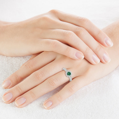 1 1/2 Carat Halo Diamond and Emerald Engagement Ring in 14 Karat White Gold
