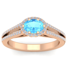1 1/2 Carat Oval Shape Antique Blue Topaz and Halo Diamond Ring In 14 Karat Rose Gold