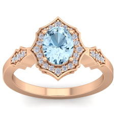 1 1/2 Carat Oval Shape Aquamarine and Diamond Ring In 14 Karat Rose Gold
