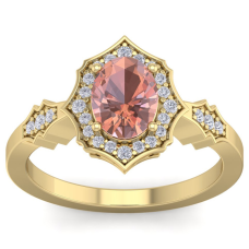 1 1/2 Carat Oval Shape Morganite and Diamond Ring In 14 Karat Yellow Gold