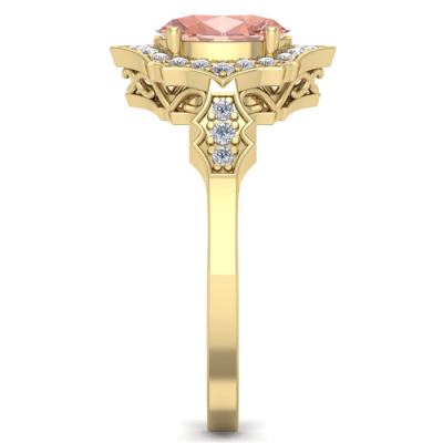 1 1/2 Carat Oval Shape Morganite and Diamond Ring In 14 Karat Yellow Gold