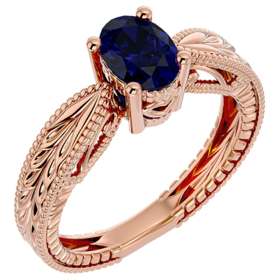 1 1/2 Carat Oval Shape Sapphire Ring With Tapered Etched Band In 14 Karat Rose Gold