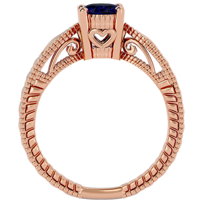 1 1/2 Carat Oval Shape Sapphire Ring With Tapered Etched Band In 14 Karat Rose Gold
