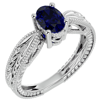 1 1/2 Carat Oval Shape Sapphire Ring With Tapered Etched Band In 14 Karat White Gold