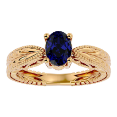 1 1/2 Carat Oval Shape Sapphire Ring With Tapered Etched Band In 14 Karat Yellow Gold