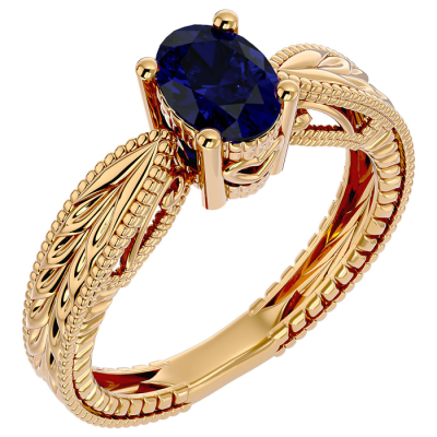 1 1/2 Carat Oval Shape Sapphire Ring With Tapered Etched Band In 14 Karat Yellow Gold