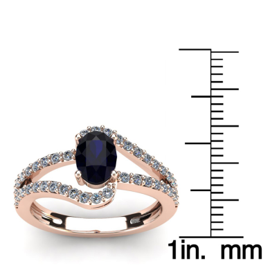 1 1/2 Carat Oval Shape Sapphire and Fancy Diamond Ring In 14 Karat Rose Gold