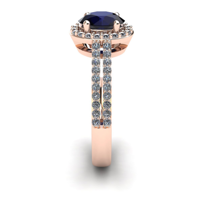 1 1/2 Carat Oval Shape Sapphire and Halo Diamond Ring In 14 Karat Rose Gold