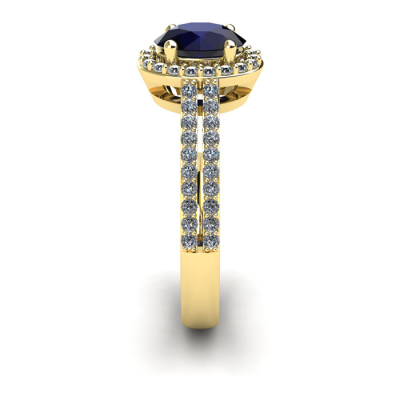 1 1/2 Carat Oval Shape Sapphire and Halo Diamond Ring In 14 Karat Yellow Gold