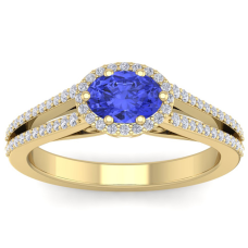 1 1/3 Carat Oval Shape Antique Tanzanite and Halo Diamond Ring In 14 Karat Yellow Gold